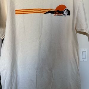 Patagonia Beige Tee with Orange and Black Graphic